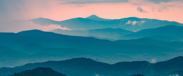 Layered blue ridgelines of Sassafras Mountain at dusk, South Carolina